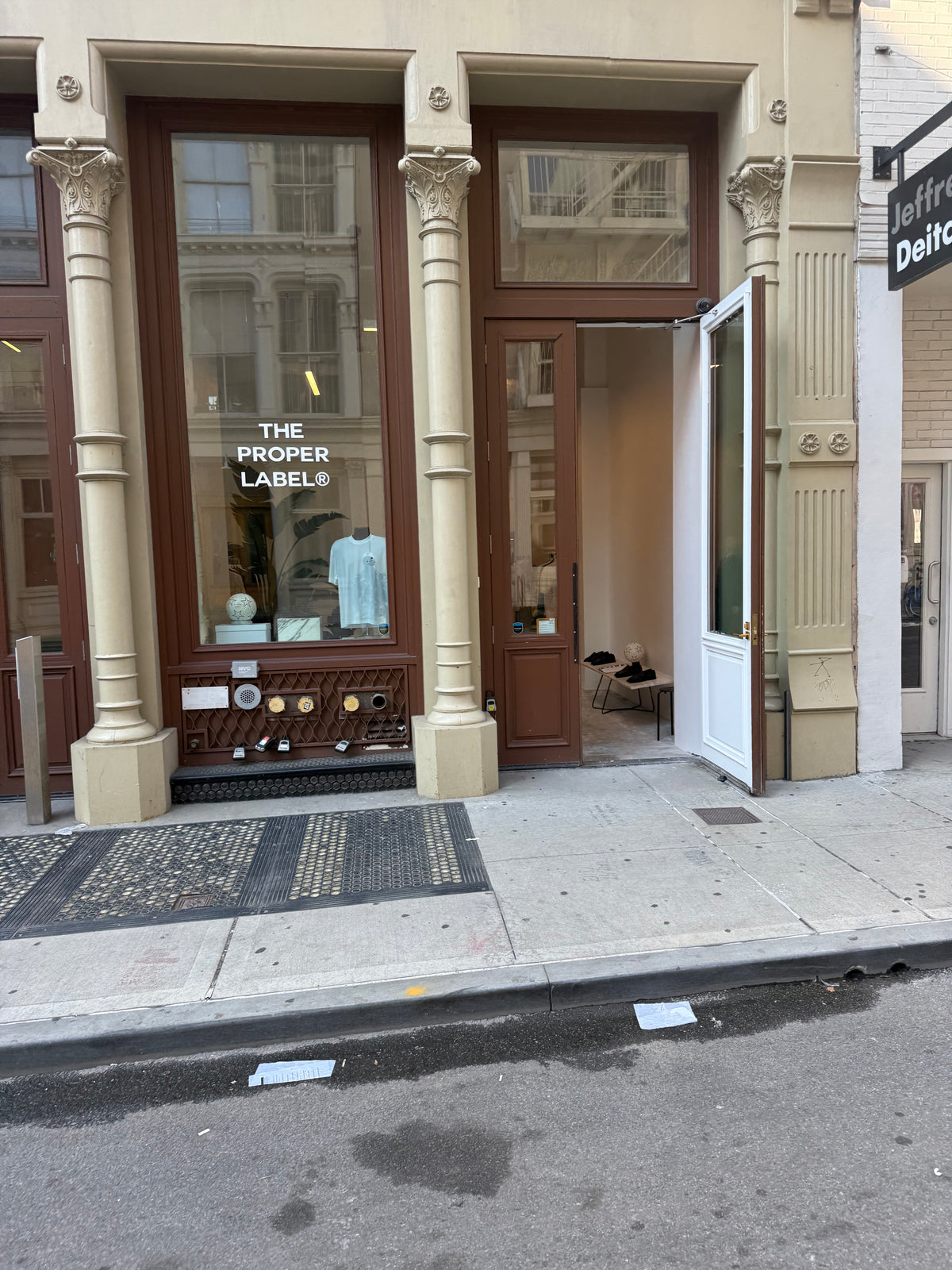 The Proper Label storefront and open entrance at 74 Grand Street in SoHo