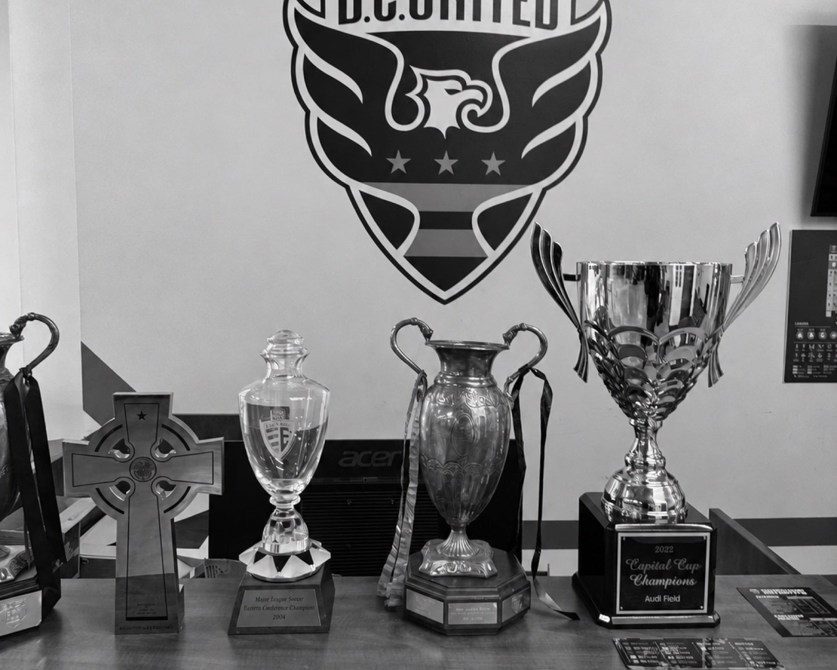 Trophies, patches and printed images: the different ways a club keeps its history.