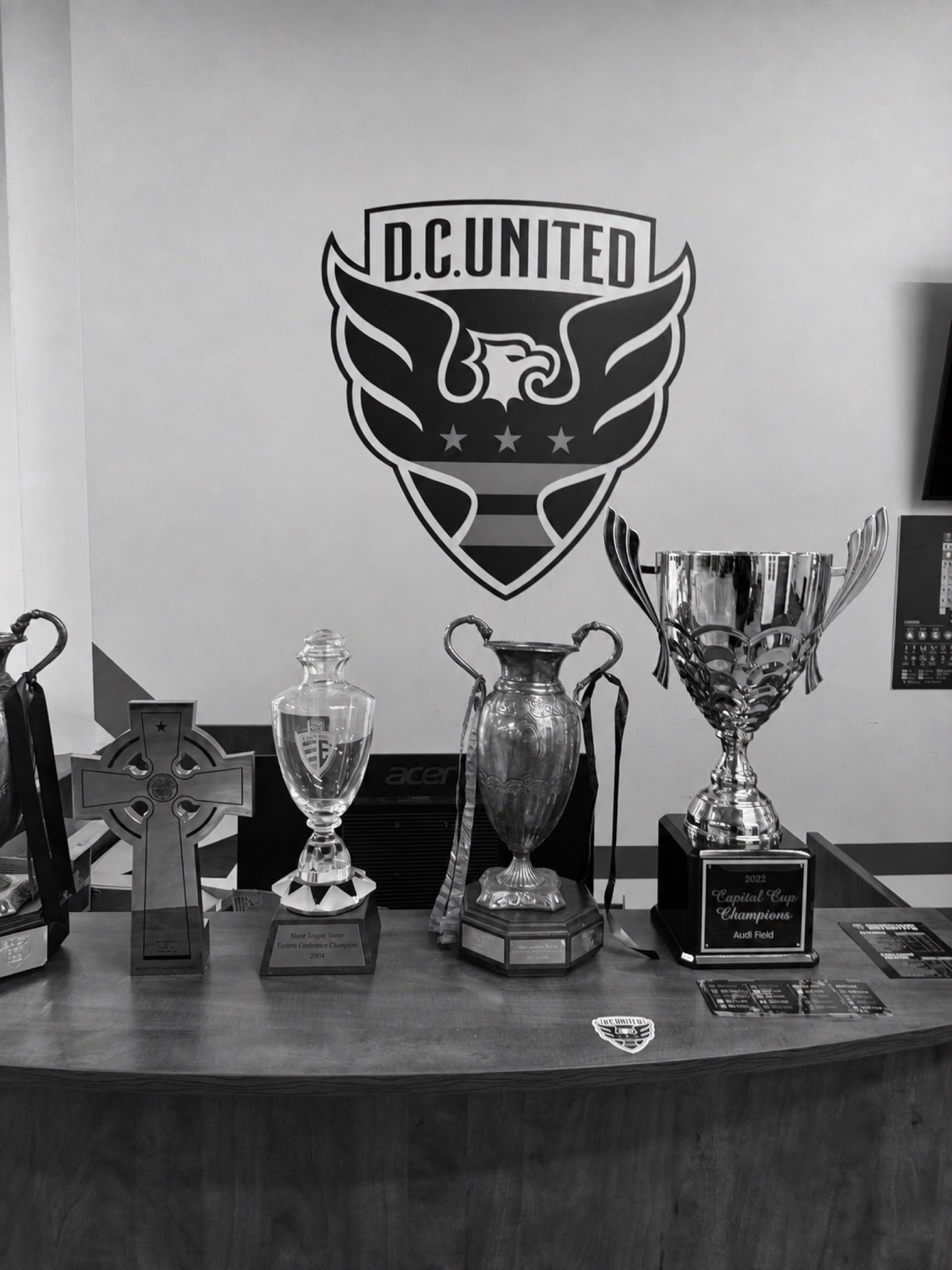 Trophies, patches and printed images: the different ways a club keeps its history.