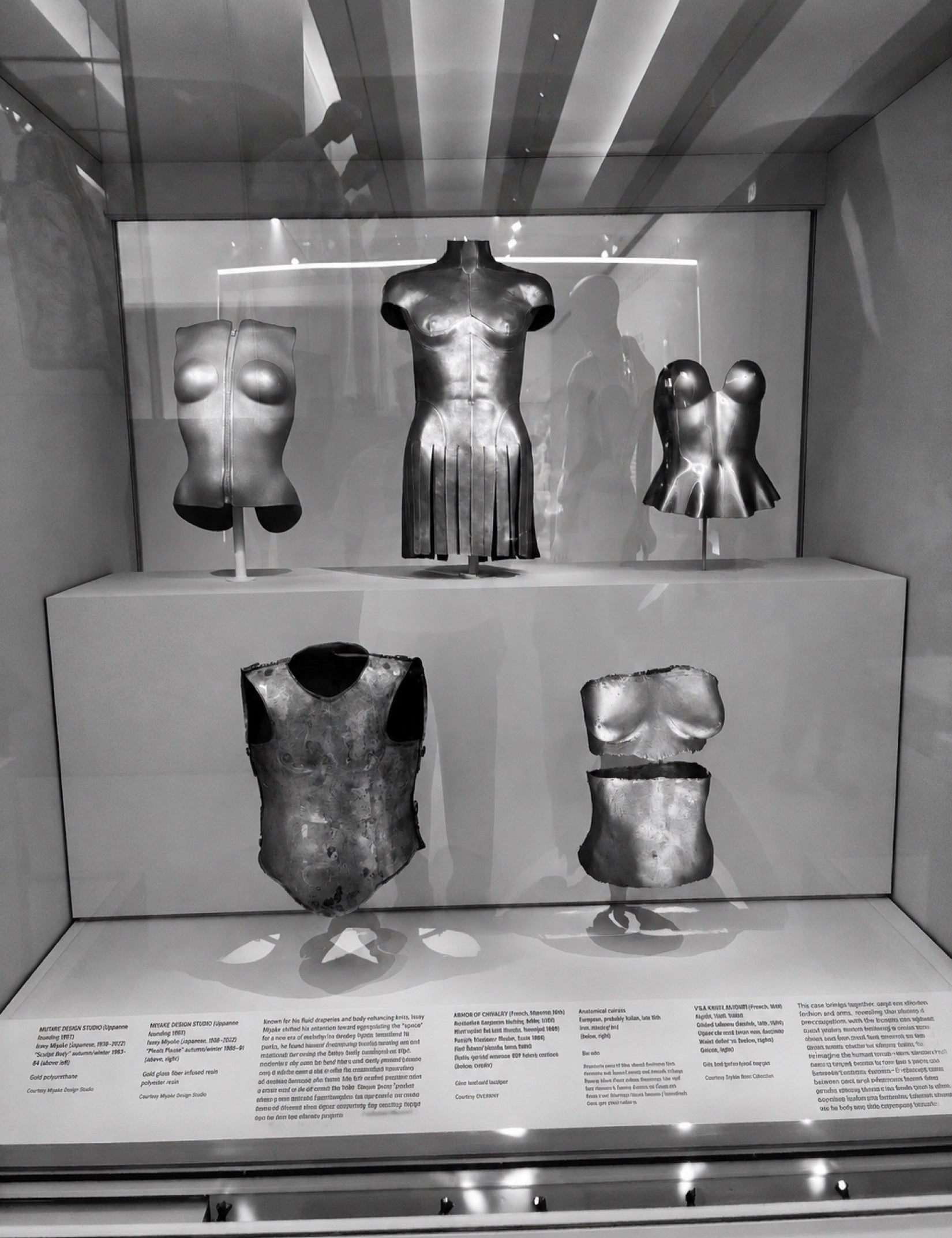 Museum objects and the practice of looking beyond a garment rail.