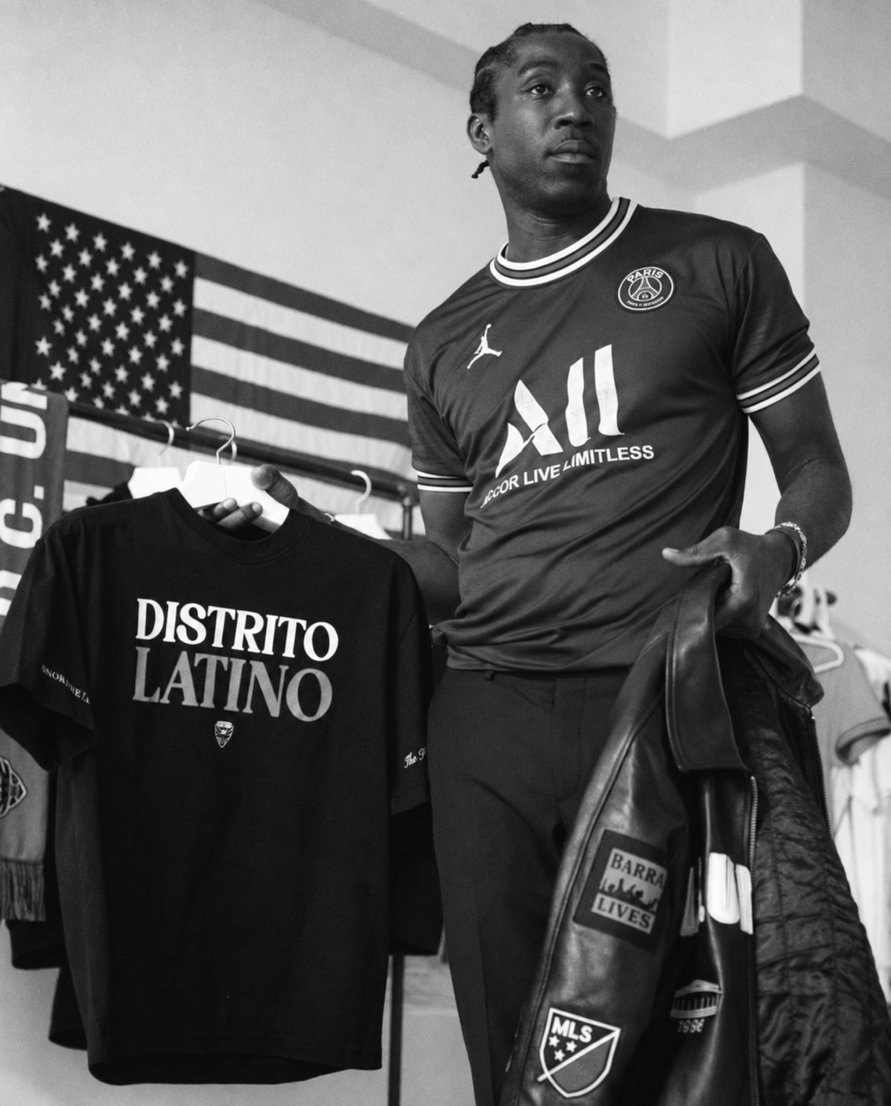 Club identity across a T-shirt, a hoodie, a scarf and a leather jacket.
