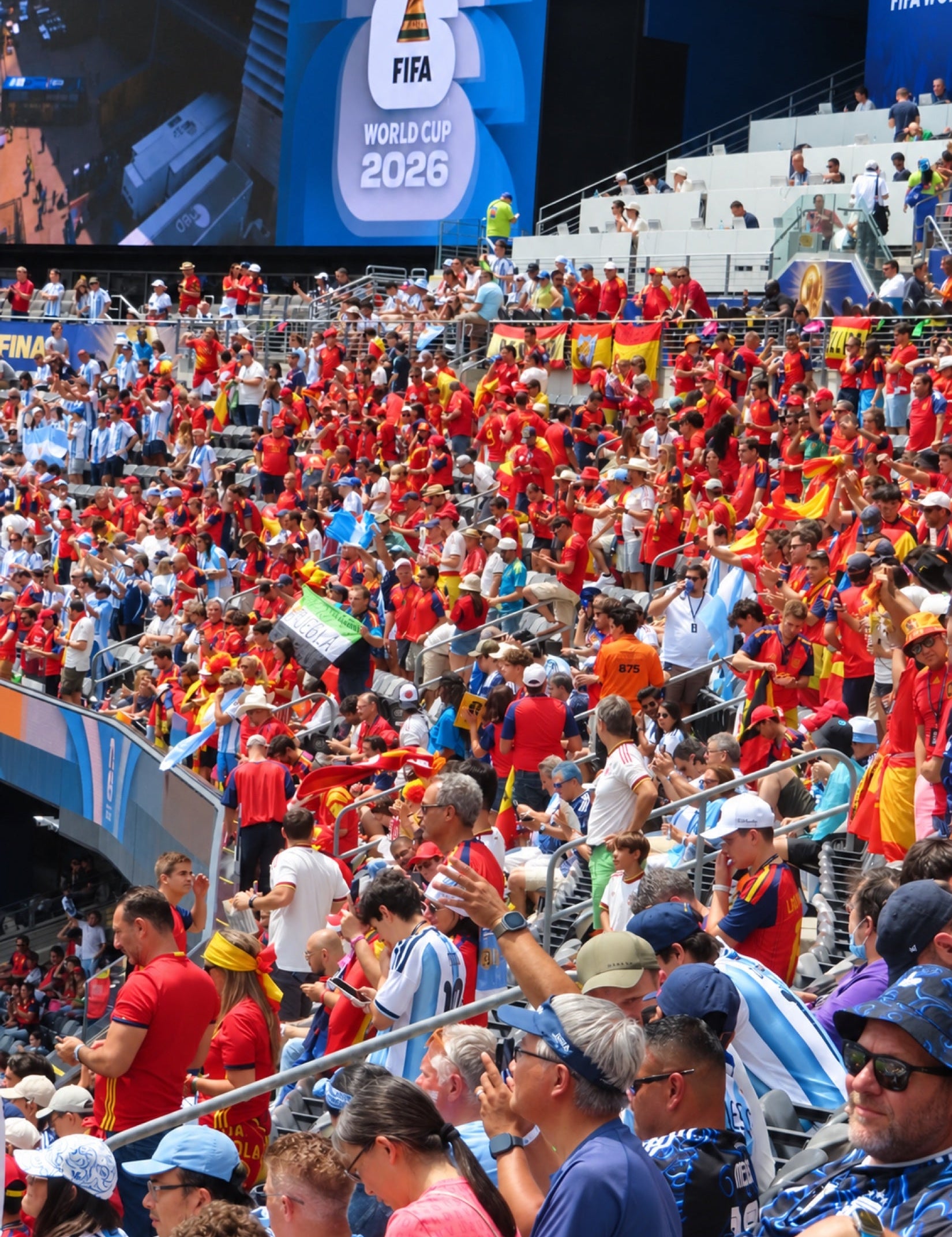 Red and sky blue meet in the crowd at the 2026 World Cup final.
