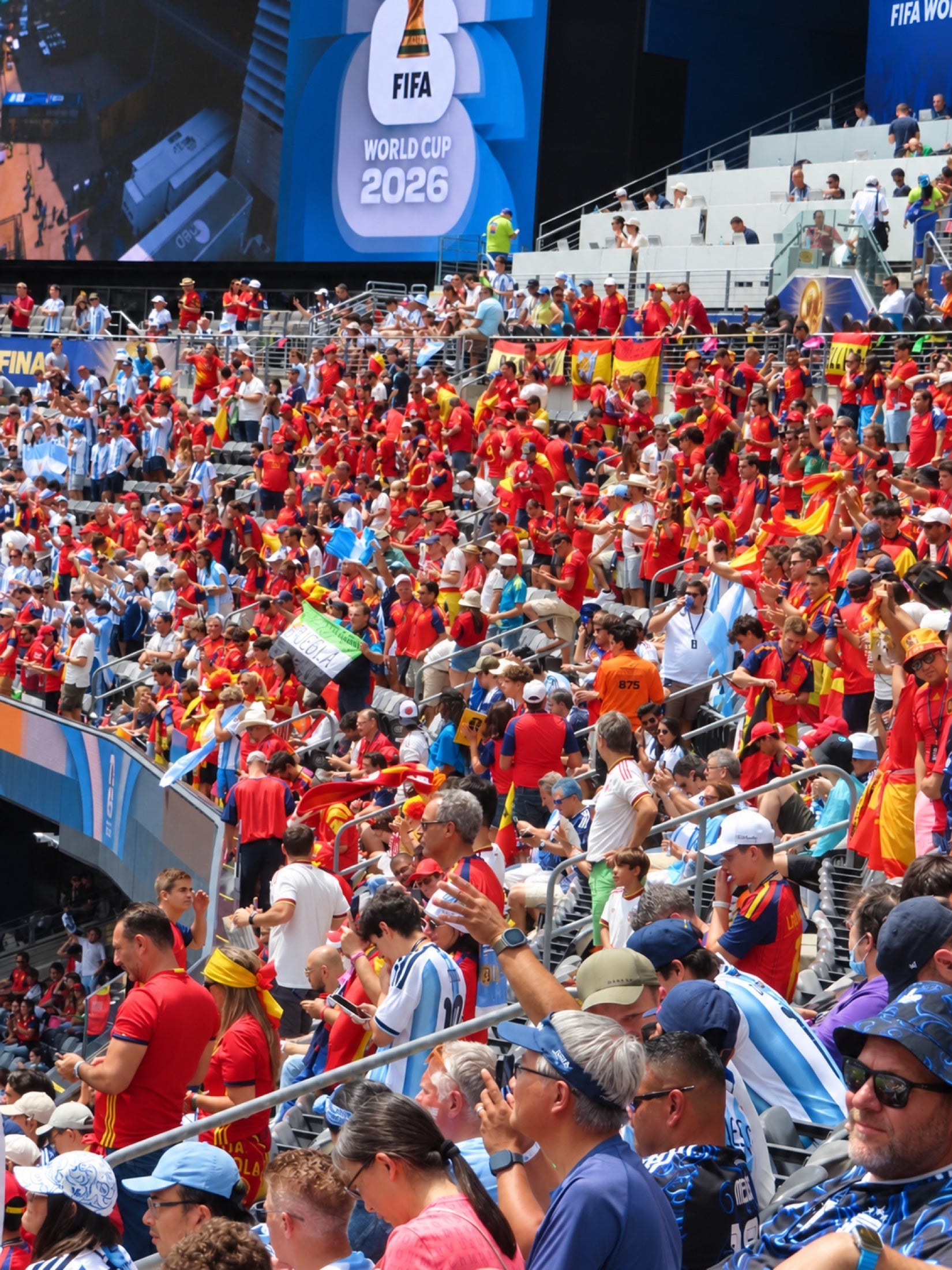 Red and sky blue meet in the crowd at the 2026 World Cup final.