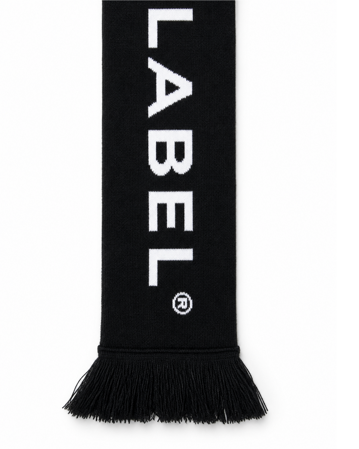 City Scarf — signature lettering and fringe detail