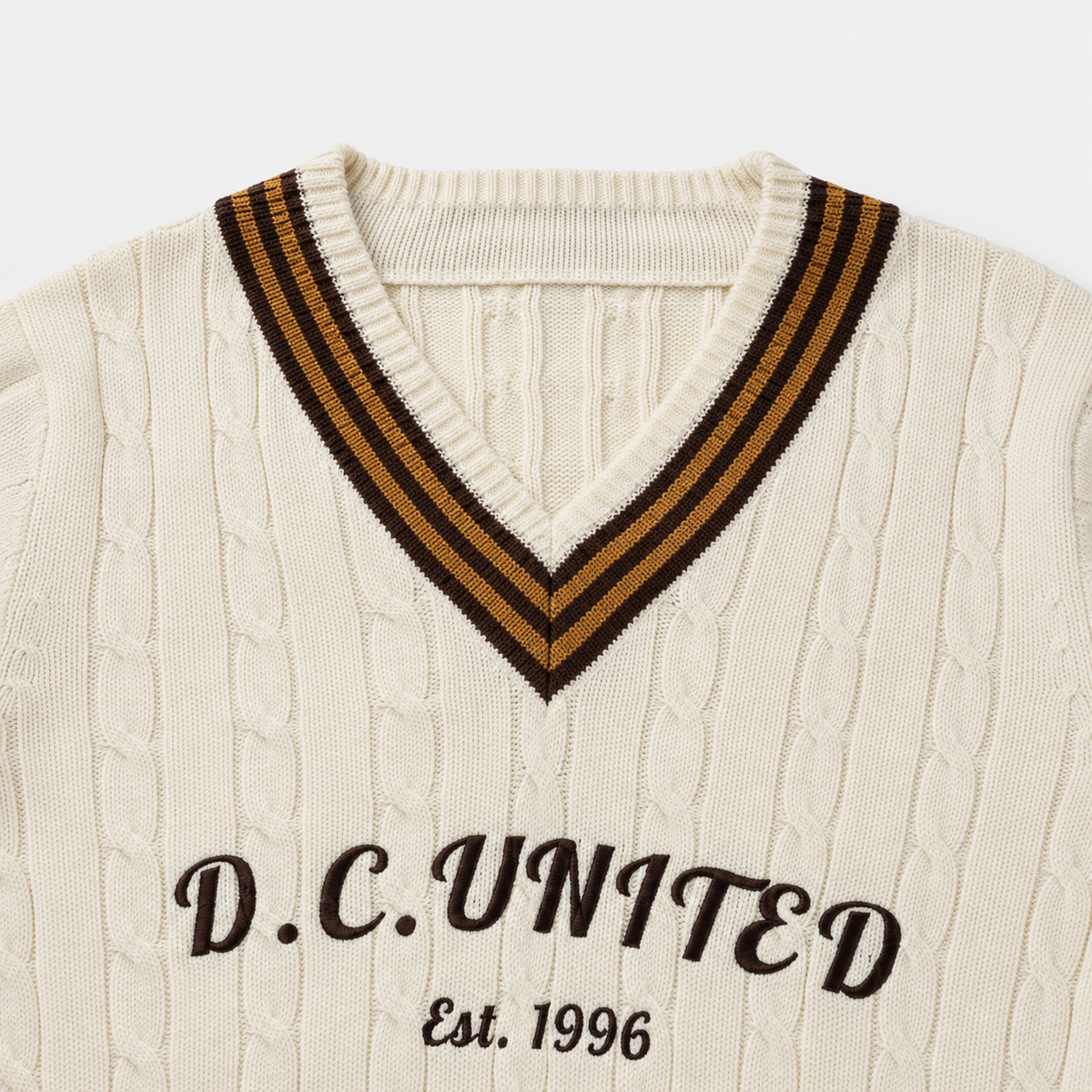 D.C. United — The District Cable-Knit Sweater — V-neck and chest embroidery detail