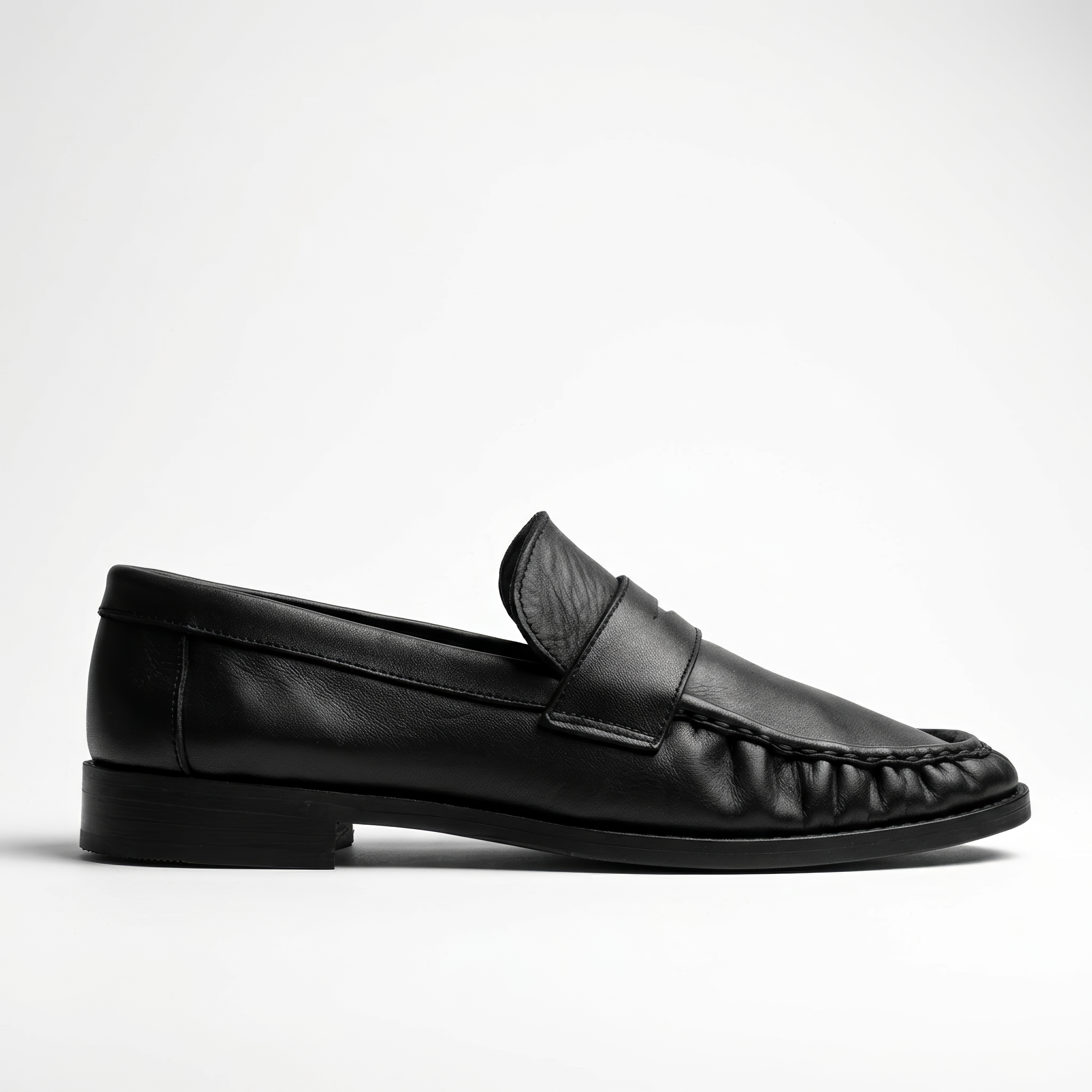 Black loafers Moccasins on a white background