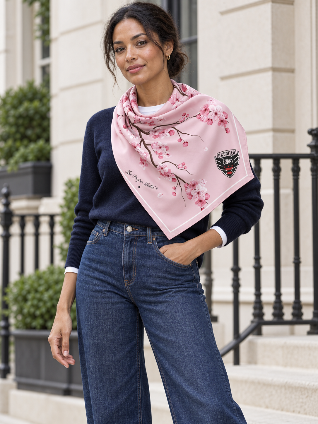 Cherry Blossom Scarf — editorial styling with navy knit and indigo jeans, digitally created from the scarf artwork