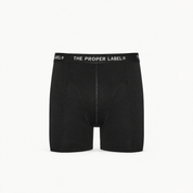 Boxer briefs — black — single product view on the Maison studio background.