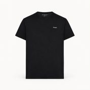 Essential T-shirt — black — single product view on the Maison studio background.