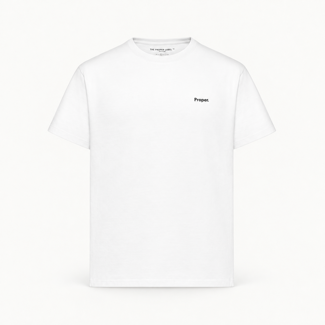 Essential T-shirt — white — single product view on the Maison studio background.