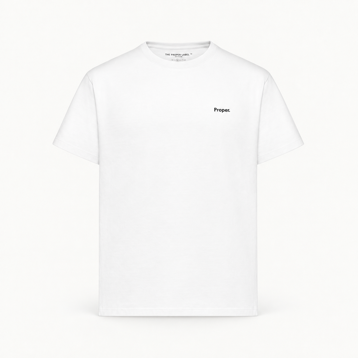Essential T-shirt — white — single product view on the Maison studio background.