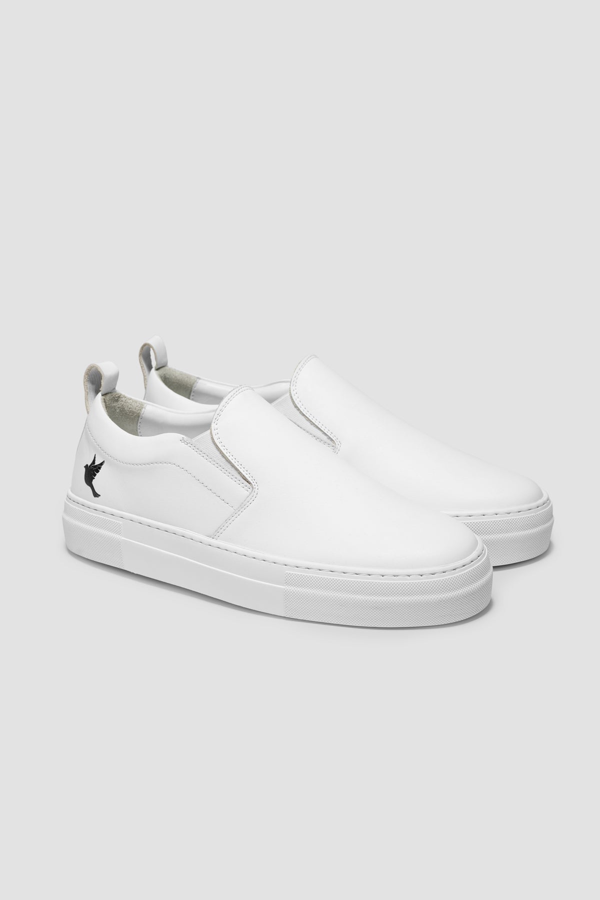 The Dove Slip-On — White — studio view 02