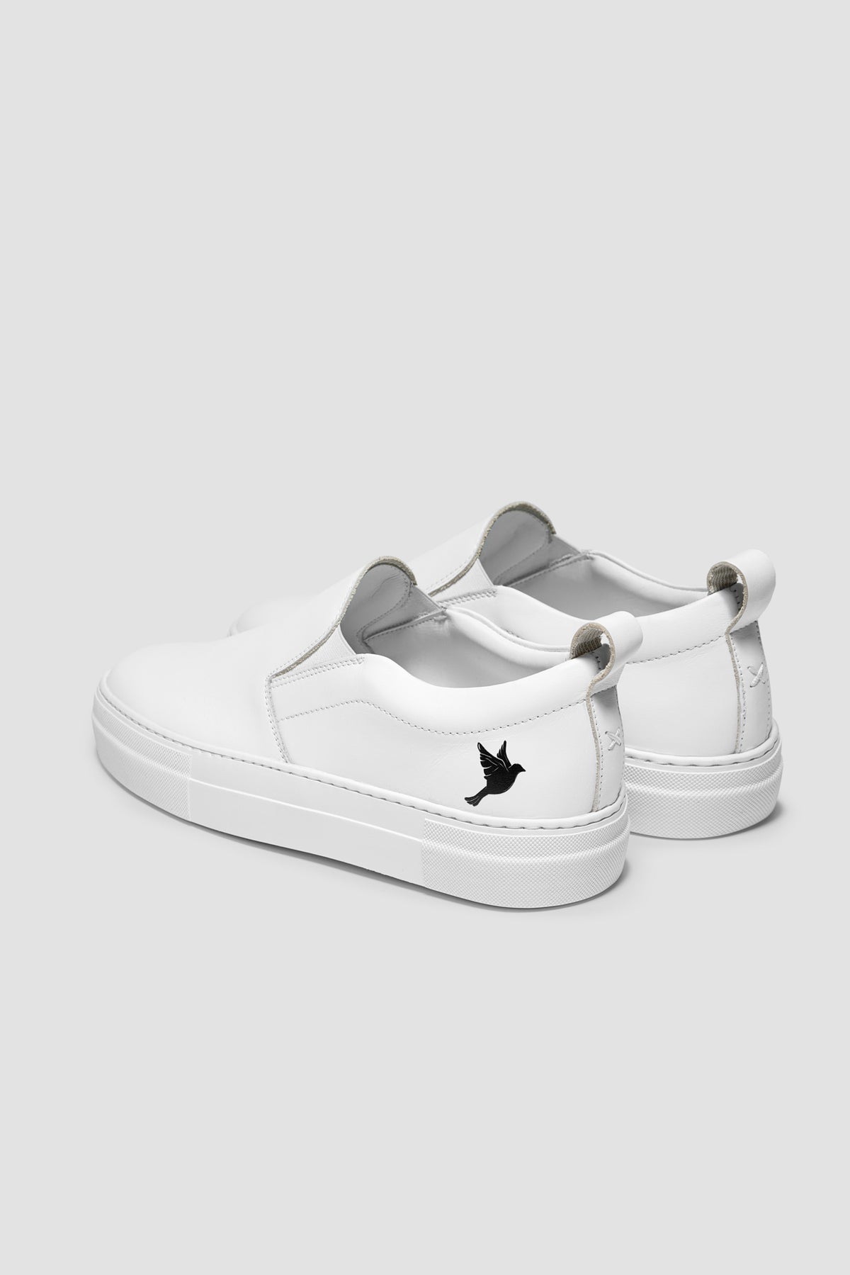 The Dove Slip-On — White — studio view 03