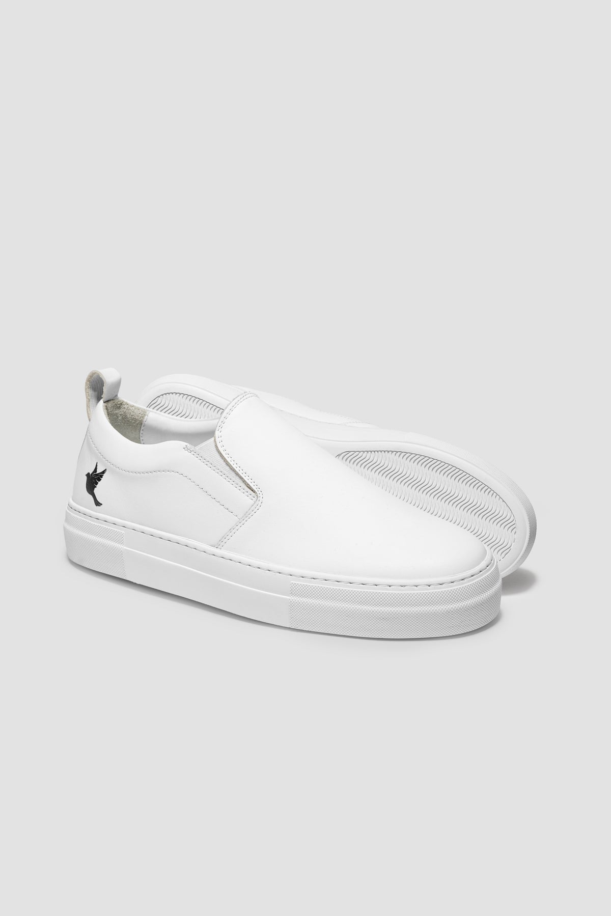 The Dove Slip-On — White — studio view 04