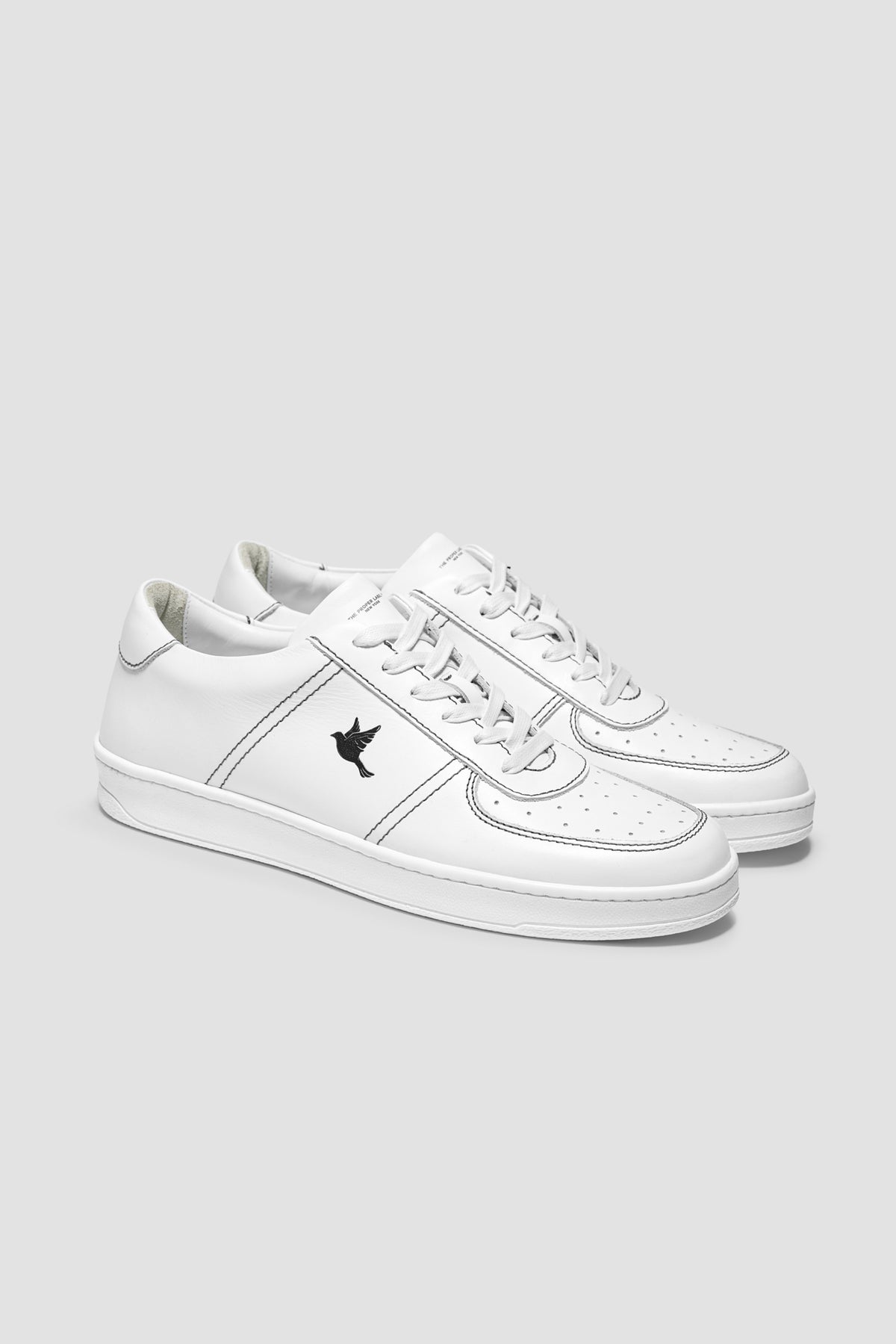 The Proper Fly Sneaker — White / Black — studio view 02