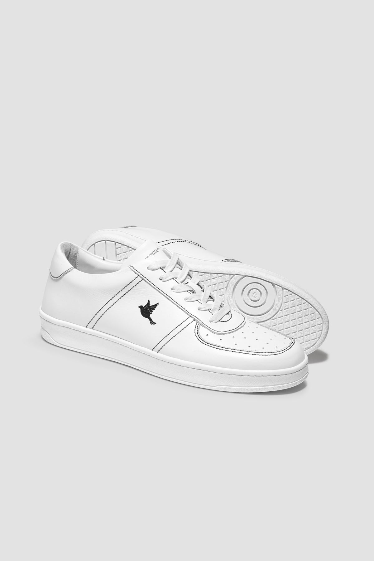 The Proper Fly Sneaker — White / Black — studio view 04