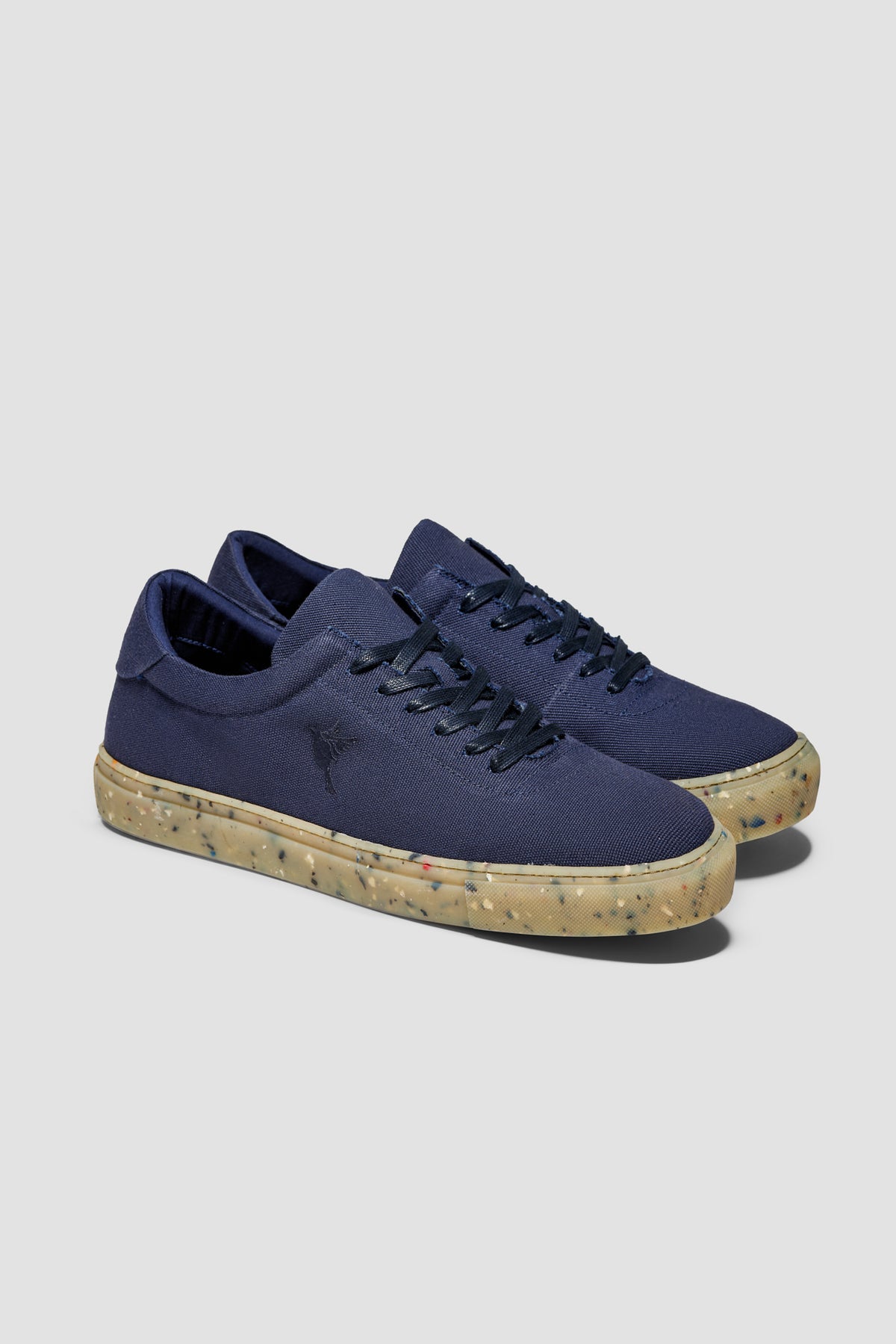 The Hampton Sneaker — Navy — studio view 02