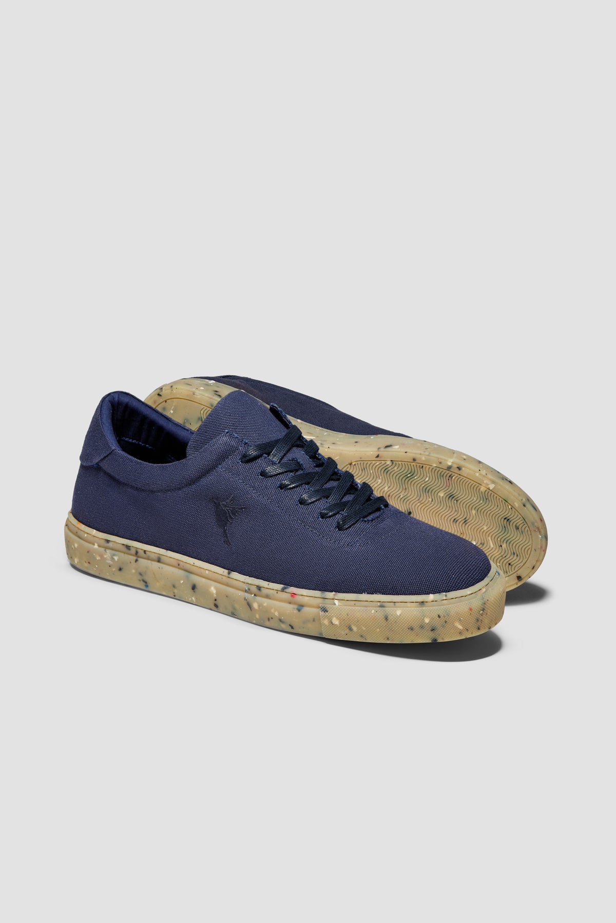 The Hampton Sneaker — Navy — studio view 04