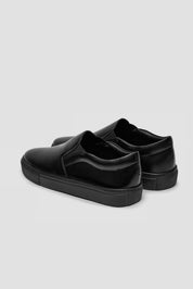 The Proper Slip-On — Black — studio view 03