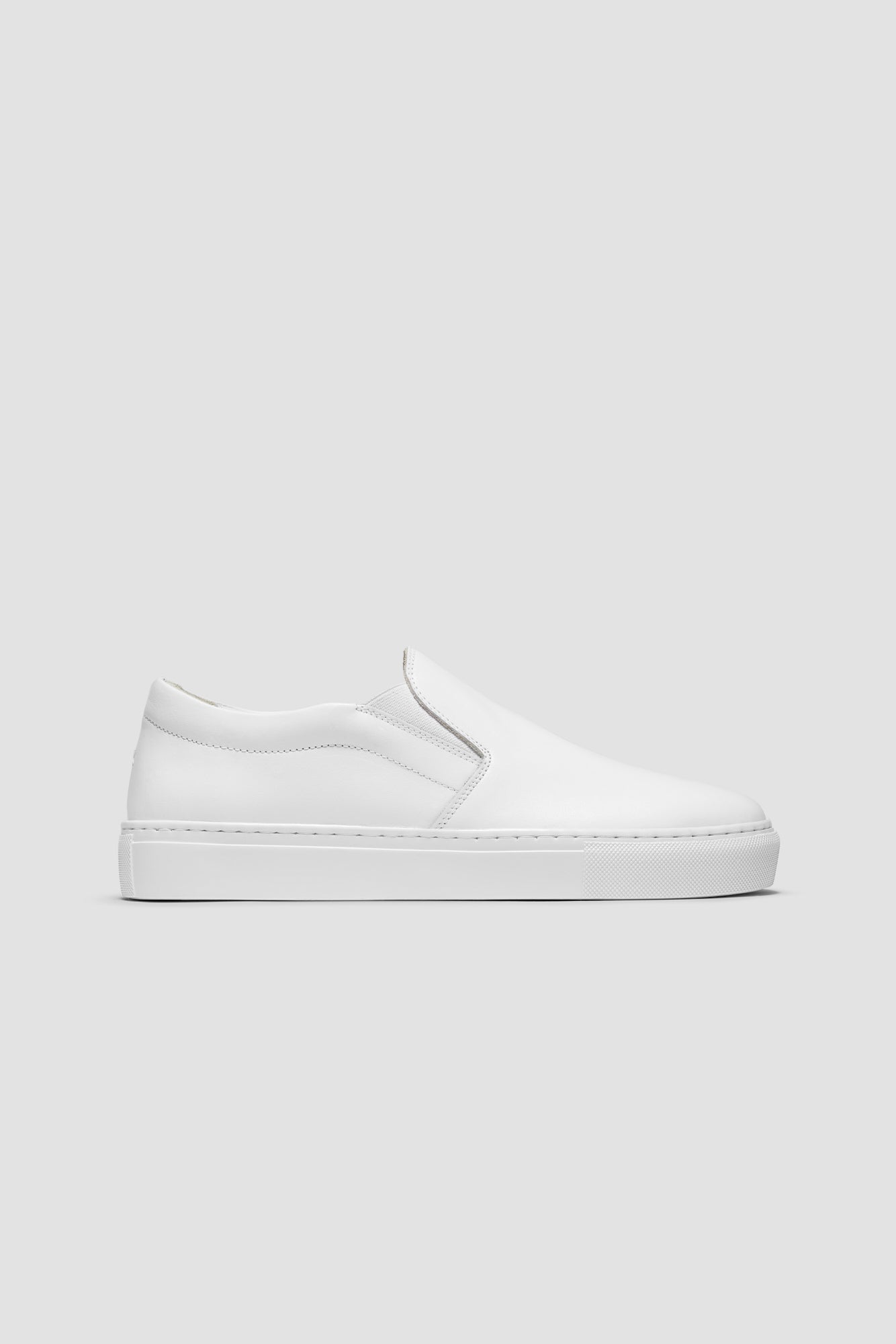 The Proper Slip-On — White — studio view 01