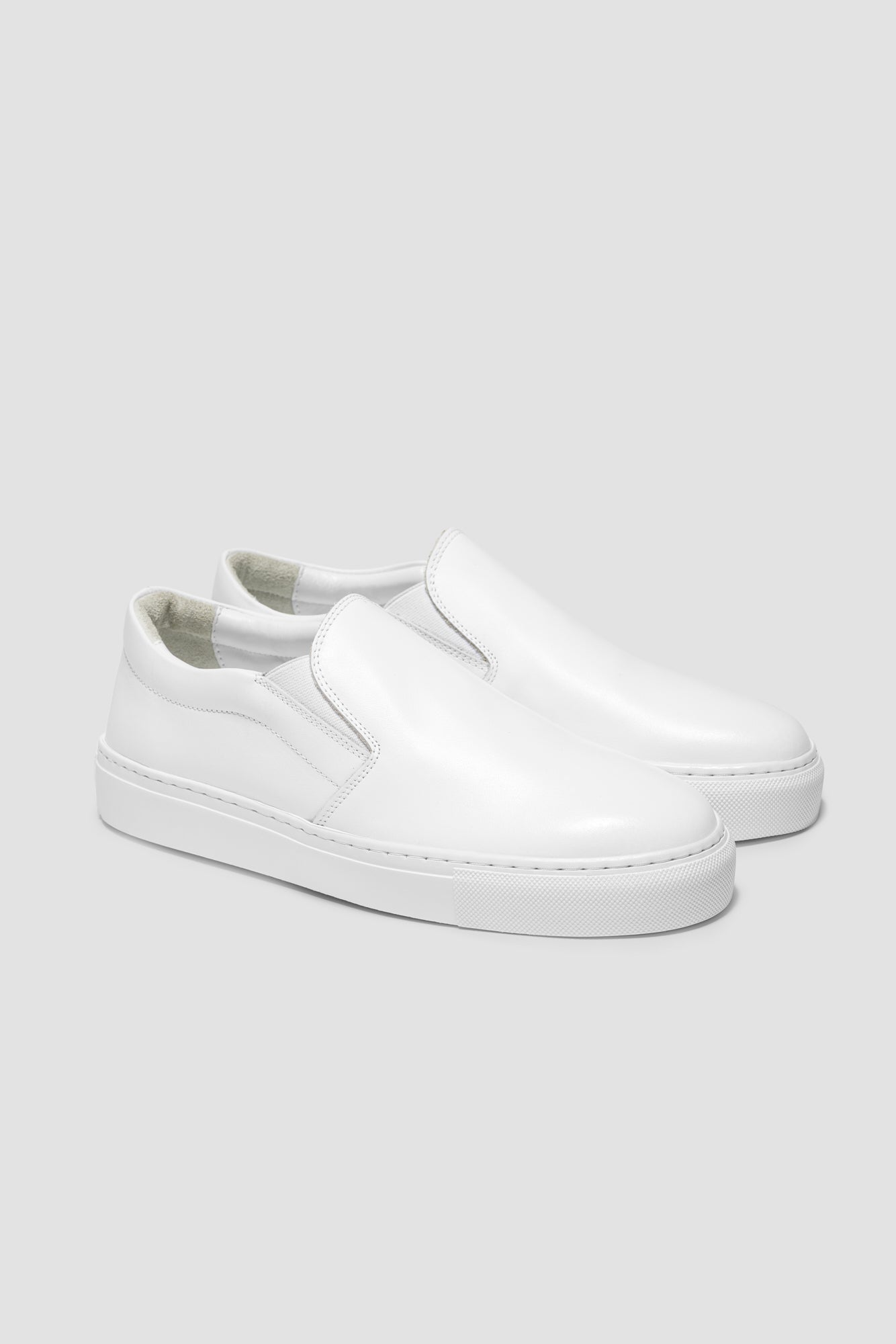 The Proper Slip-On — White — studio view 02