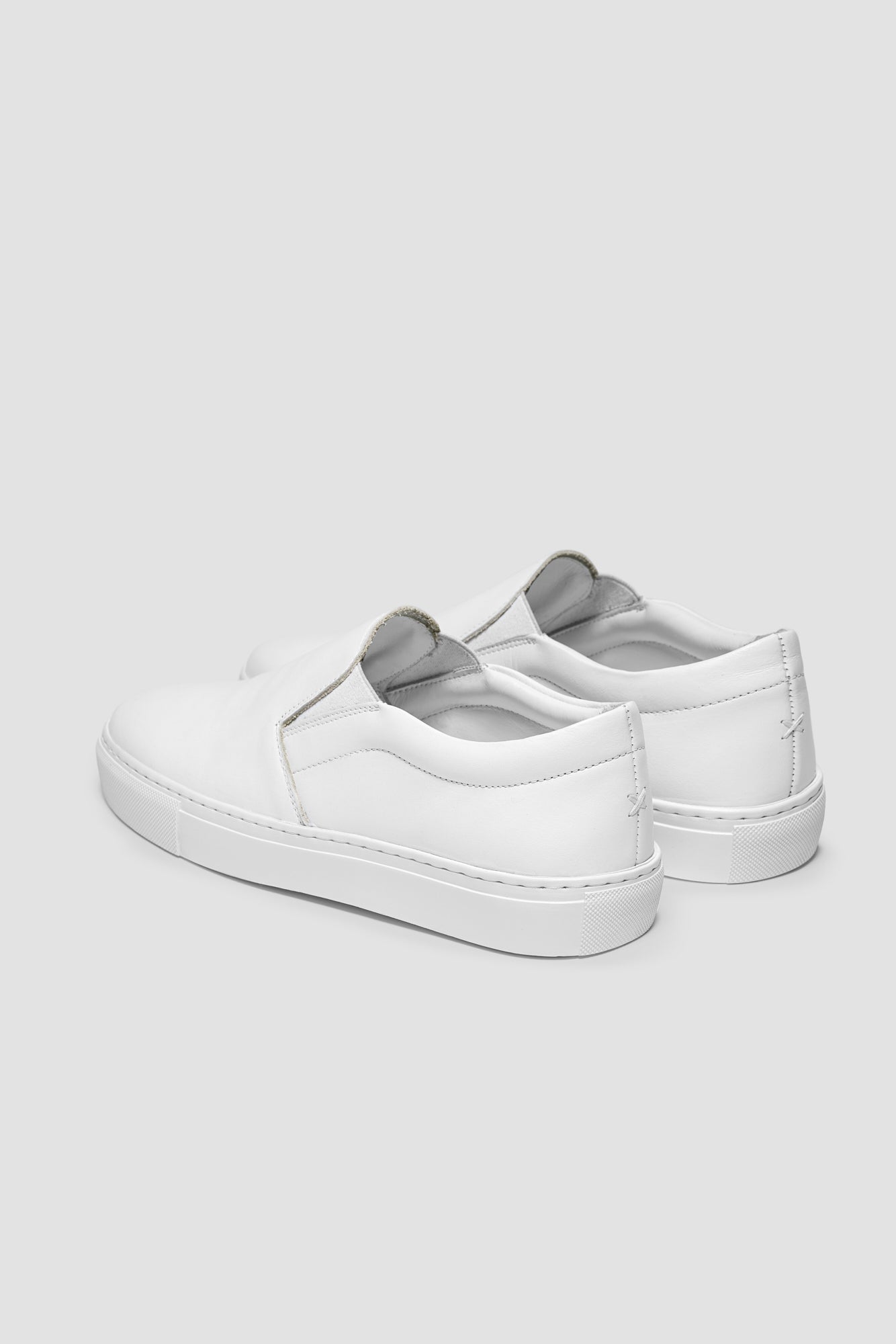 The Proper Slip-On — White — studio view 03
