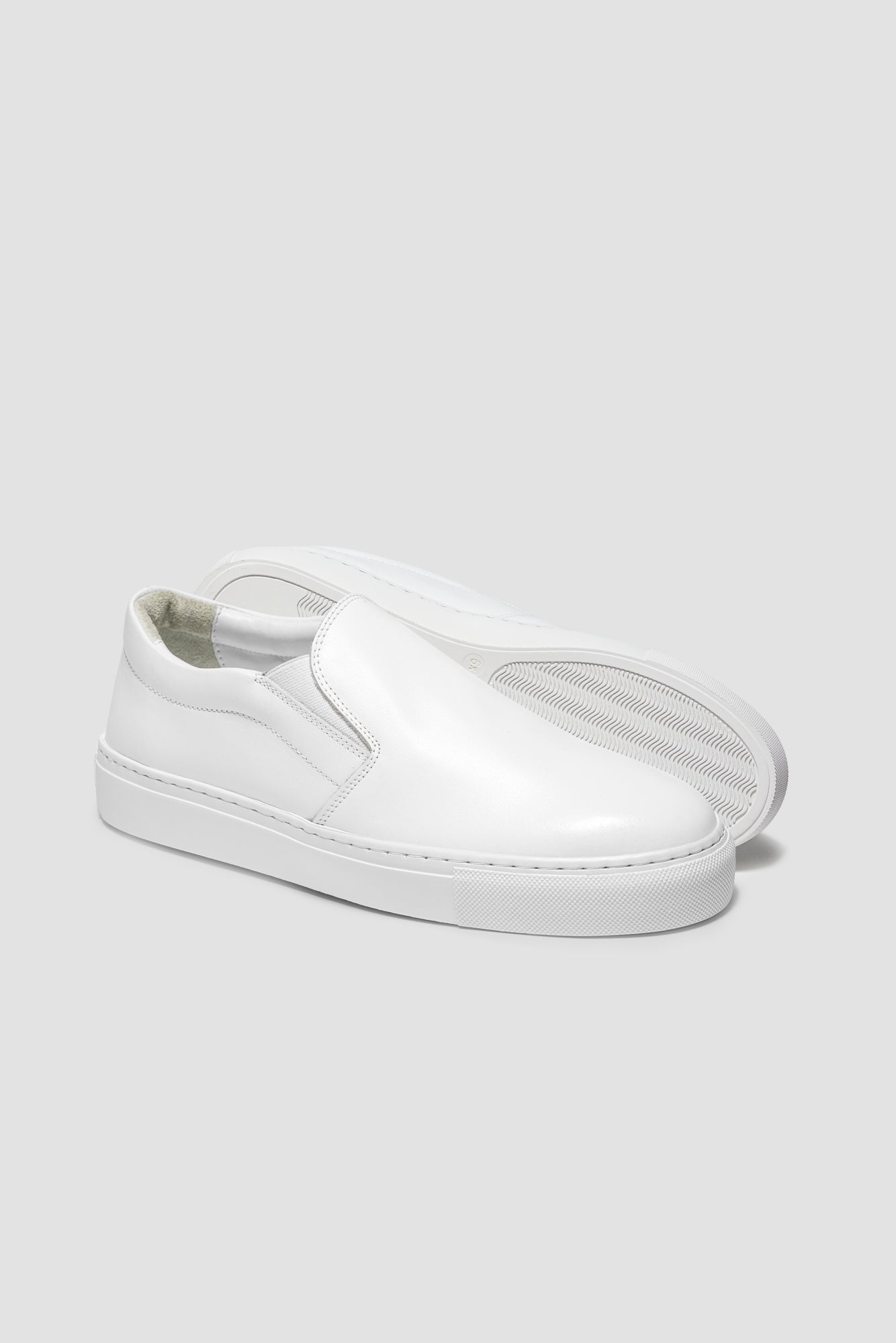 The Proper Slip-On — White — studio view 04