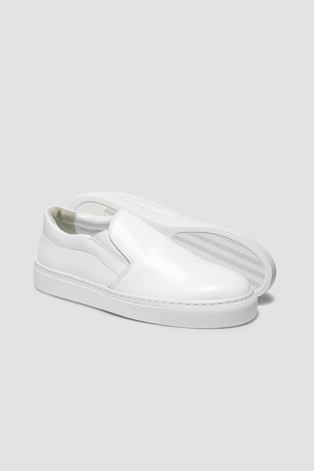 The Proper Slip-On — White — studio view 04