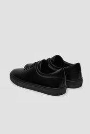 The Proper Sneaker — Black — studio view 03