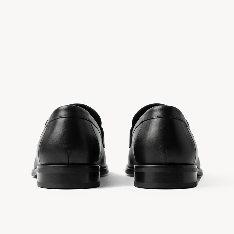 The Proper Moccasin, black leather loafers — back of the heels
