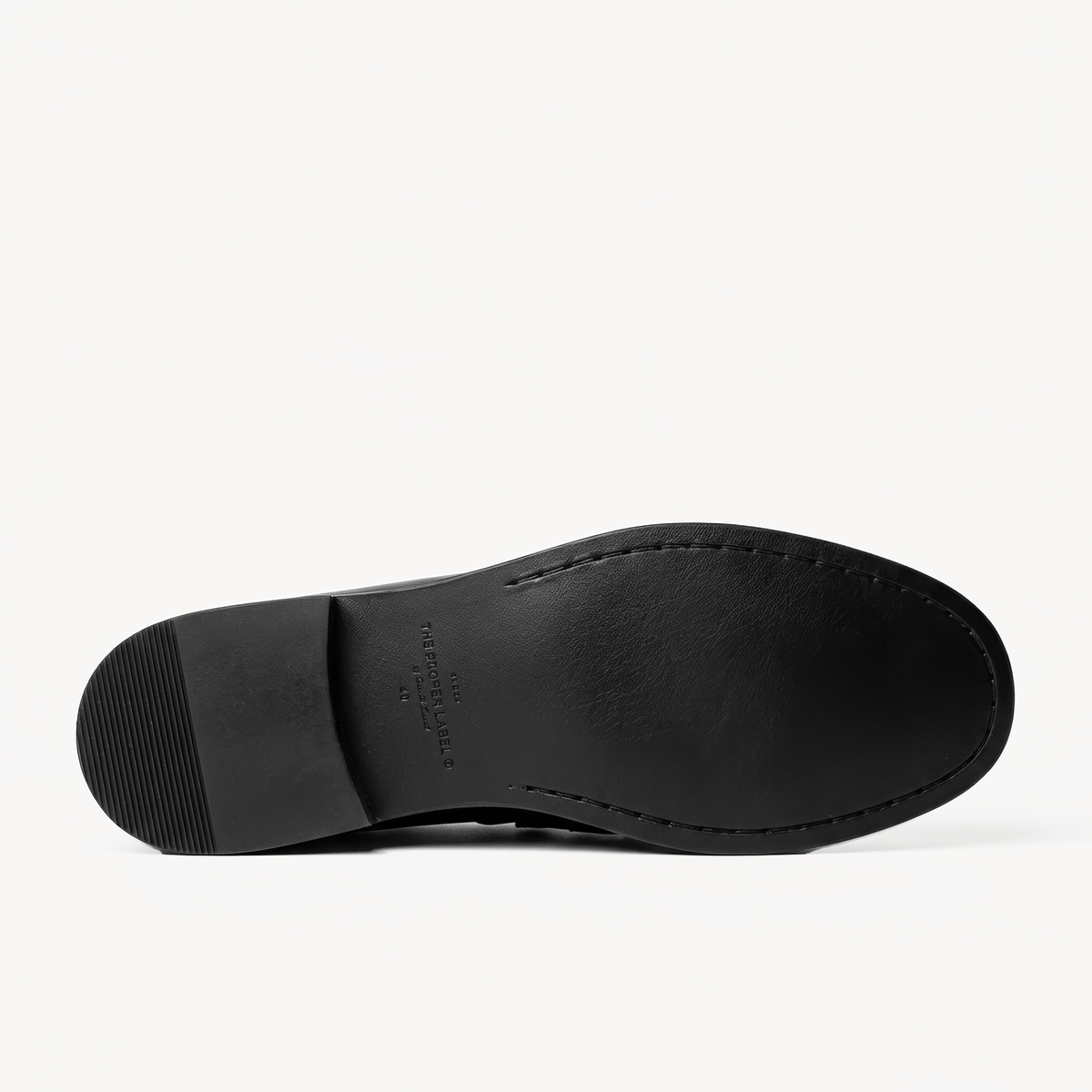 The Proper Moccasin, black leather loafers — sole detail