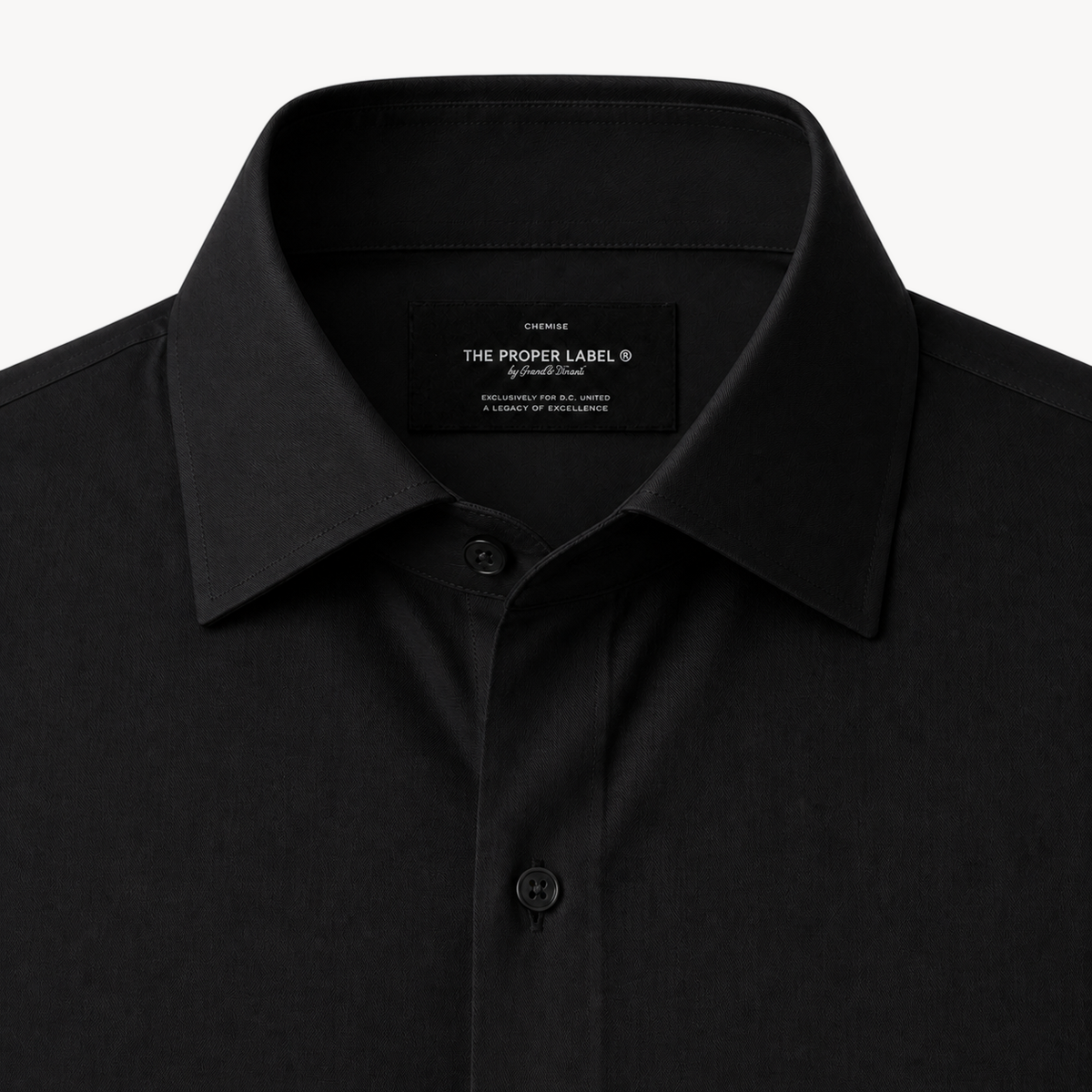 The Executive Poplin Shirt — Noir — collar and label detail