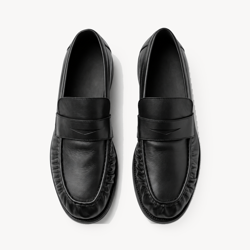 The Proper Moccasin® — Obsidian Black, overhead view of the V-cut saddles.