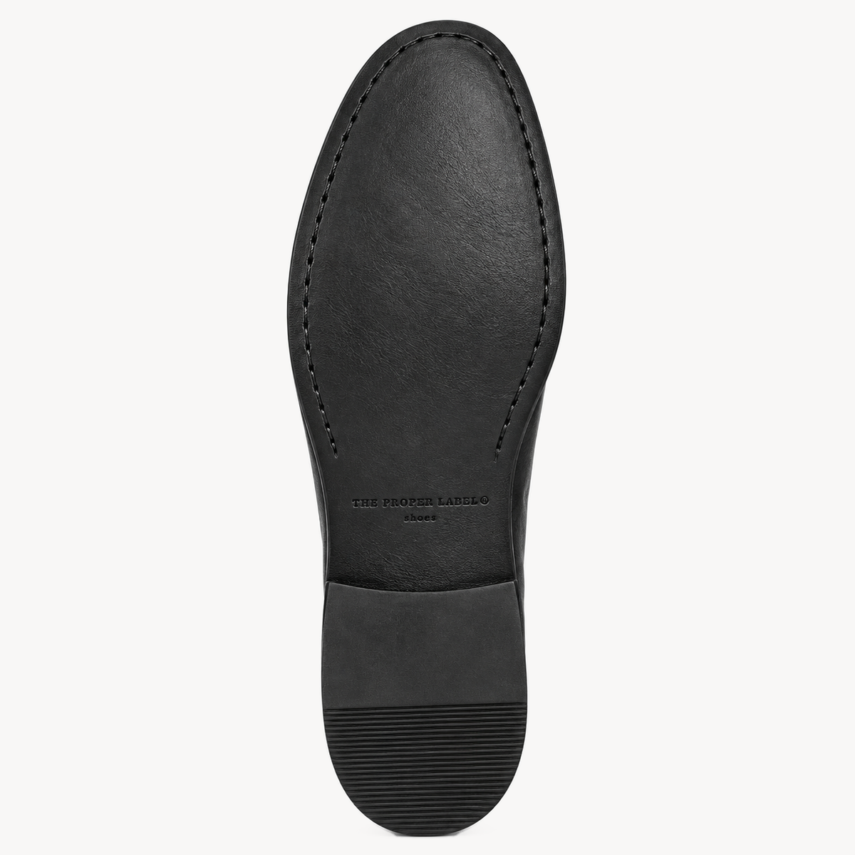 The Proper Moccasin® — calf-leather outsole with The Proper Label® signature.