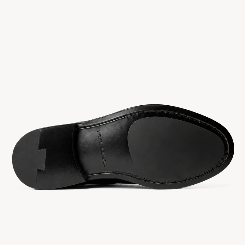 The Legacy Derby — black outsole with subtle blind embossing.