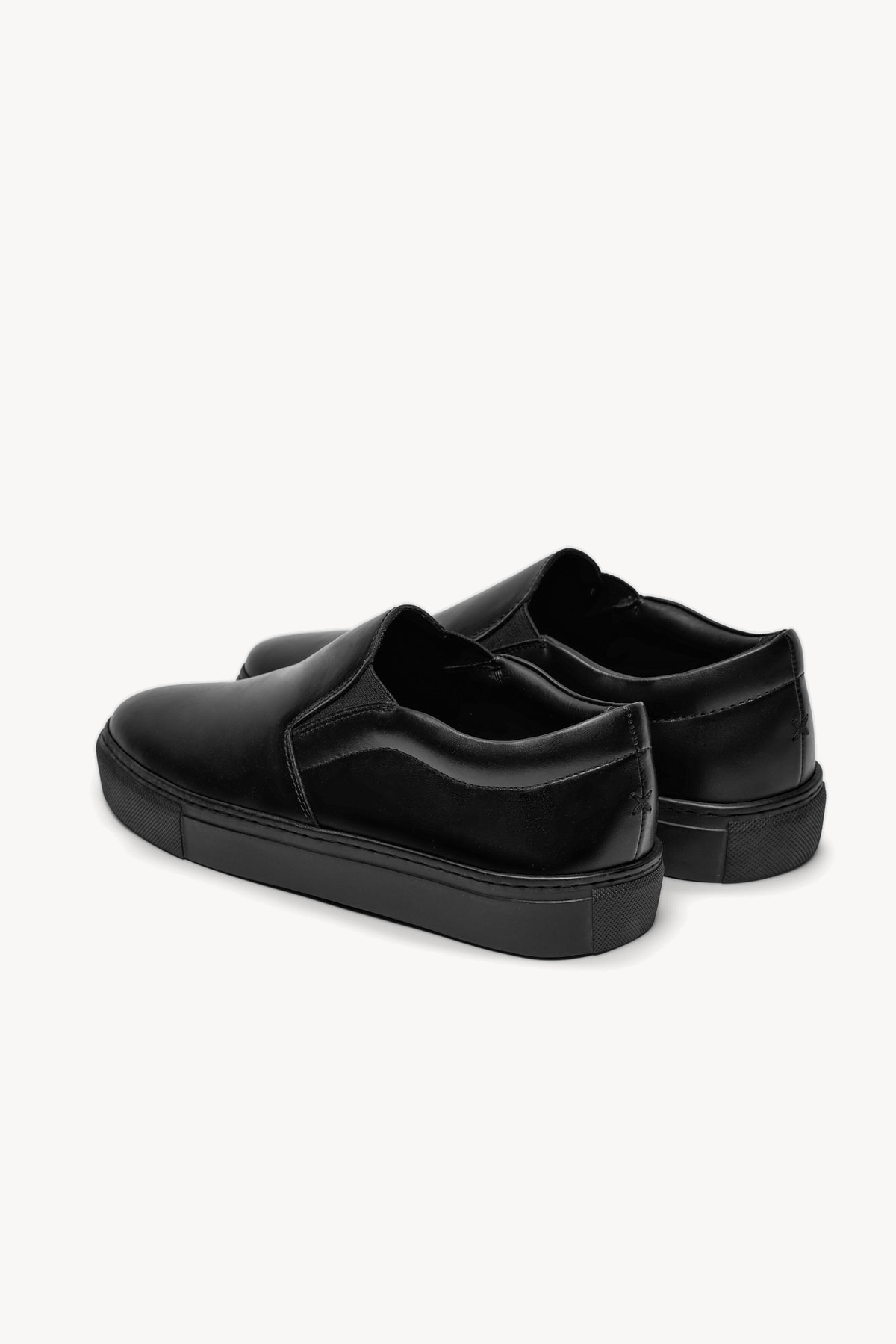 The Proper Slip-On — Black — studio view 03