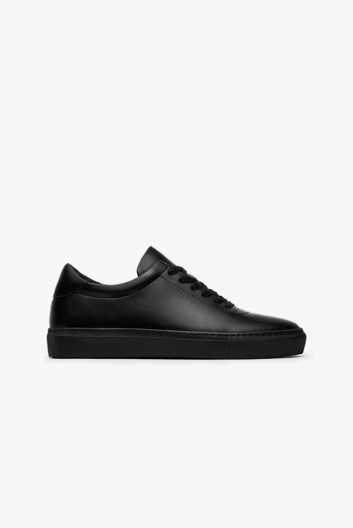 The Proper Sneaker — Black — studio view 01