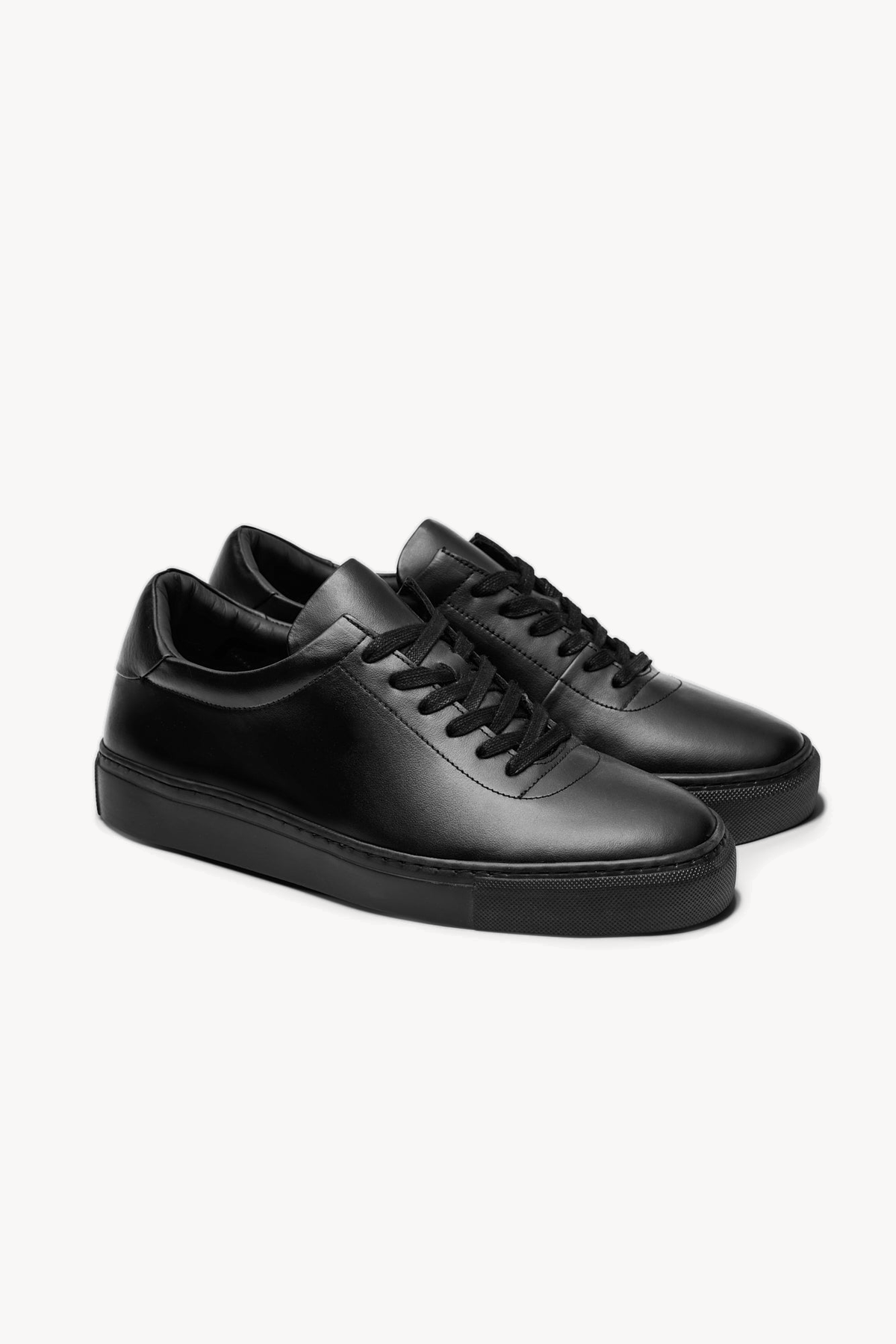 The Proper Sneaker — Black — studio view 02