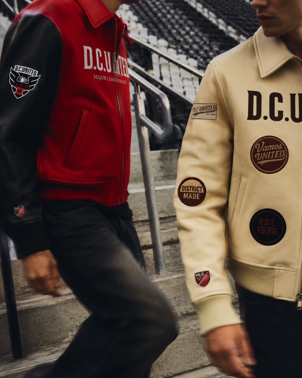 DCU Originals — red and cream D.C. United jackets on the stadium steps.