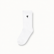 Dove socks — white / black — single product view on the Maison studio background.