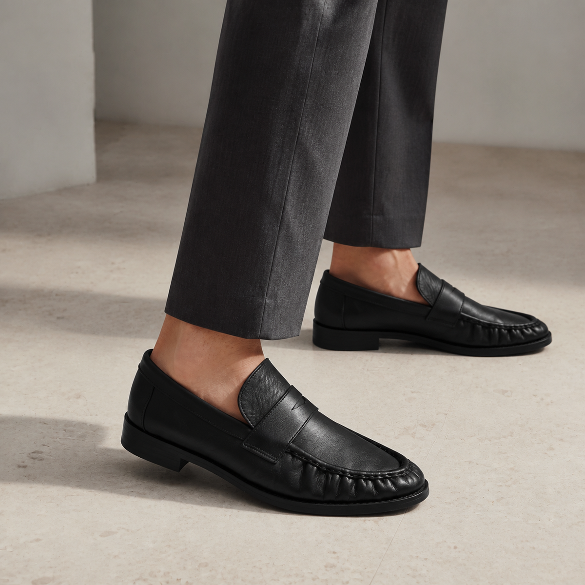 Campaign concept: The Proper Mocassin — Homme in black leather, worn with charcoal tailored trousers
