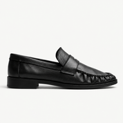 The Proper Moccasin® — Obsidian Black, side profile.
