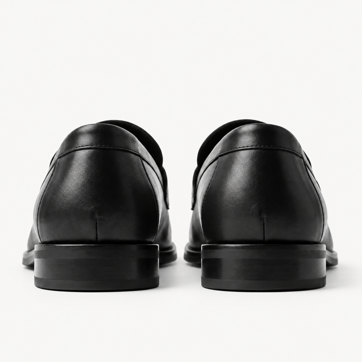 The Proper Moccasin® — Obsidian Black, heel construction.