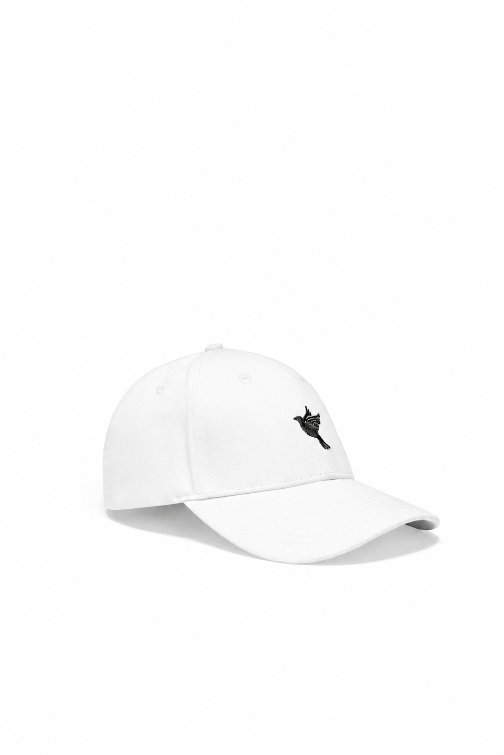 Dove cap — white — single product view on the Maison studio background.