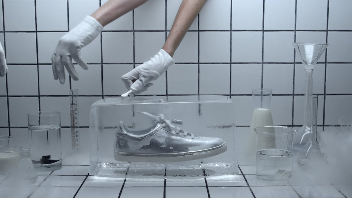 A sneaker suspended in a block of ice in the original 2014 campaign film.