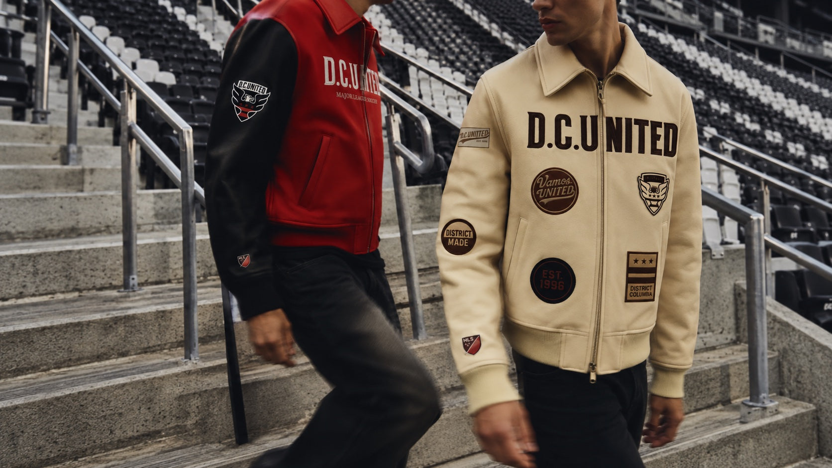 DCU Originals — red and cream D.C. United jackets on the stadium steps.